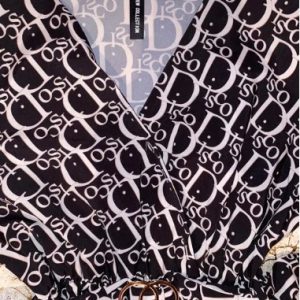 Dress in white and black with inscriptions