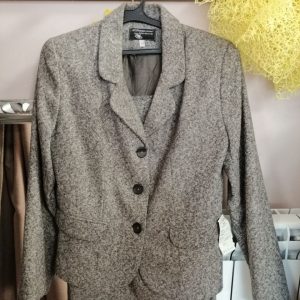 New. Women's suit with skirt