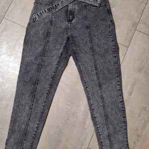 Gray jeans with a belt and trousers