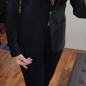 I am selling a new elegant women's black jacket