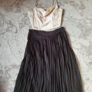Satin top and pleated skirt