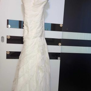 I am selling a new dress with a tag, size hs.