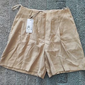 High waisted beige pants