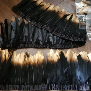 Goose feathers on ribbon black/gold
