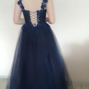 Ball gown, in dark blue.