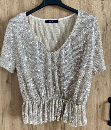 Women's blouse with sequins top