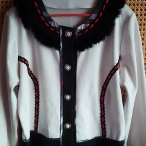 Jacket type blouse with ethnic elements with frills and puffs. Reduction
