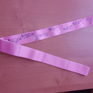 Pink rubber exercise band