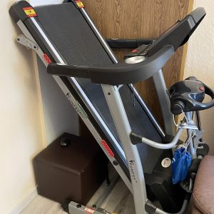 Electric running treadmill